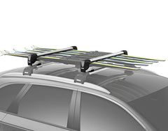 Thule SnowPack Extender slide-out design shows easy loading for skis and boards