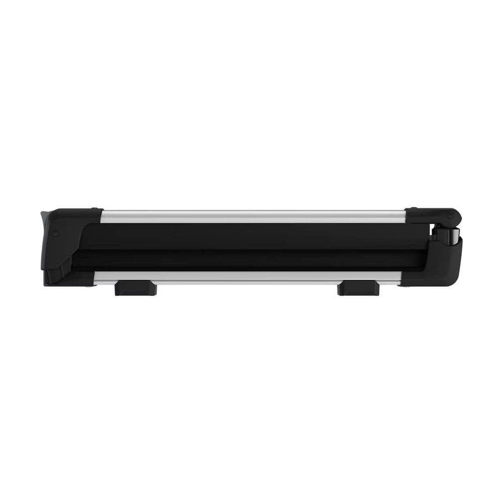 Thule SnowPack with vertical spring arms securely gripping thicker skis.