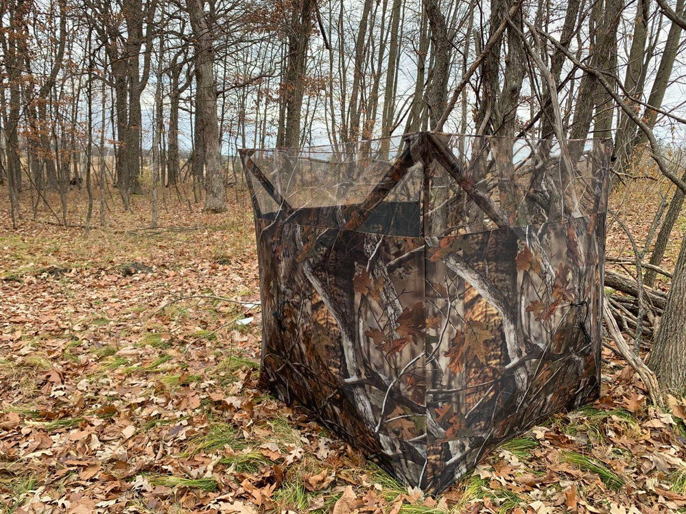 THUNDERBAY hunter in field using blind demonstrates versatile 1-2 person use.