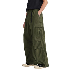 THWEI baggy cargo pants waist detail shows secure zip and button closure.