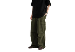 THWEI parachute pants show multiple pockets for urban daily carry.