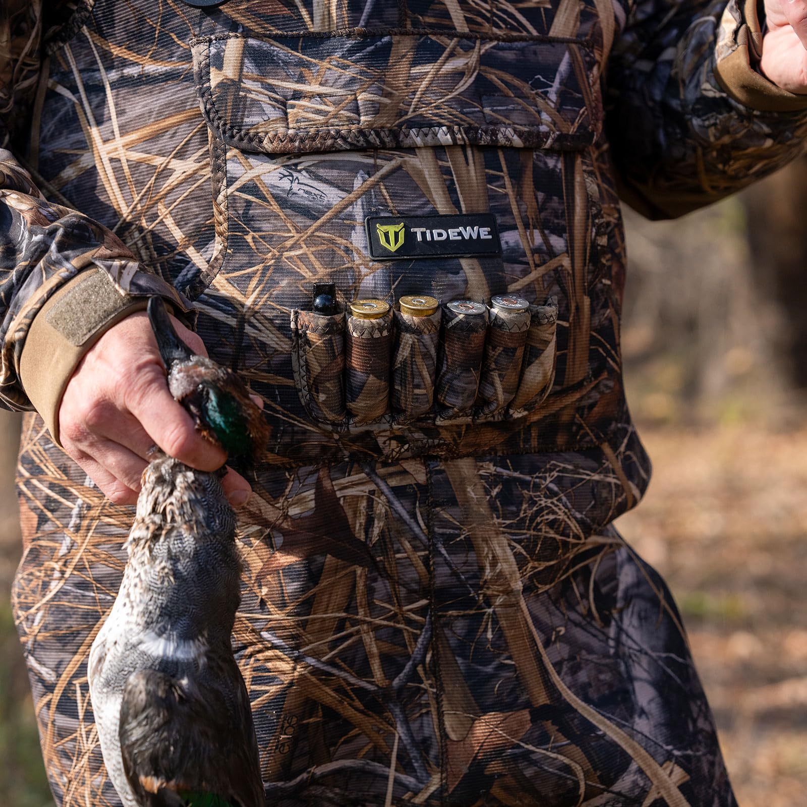 TIDEWE Evos waders traction sole demonstrating rugged tread for wet, muddy surfaces.
