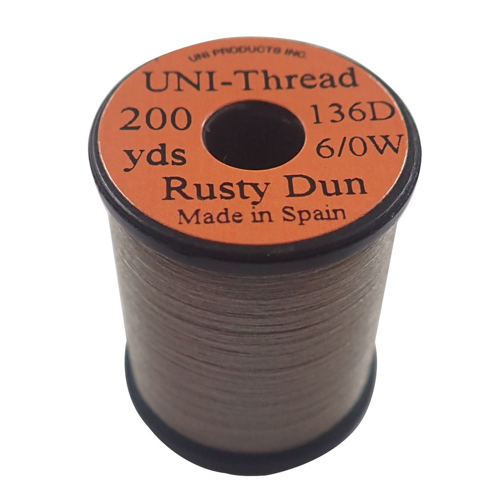 TIEMCO UNI thread 6/0 rustidan spool, smooth wraps for standard fly tying.