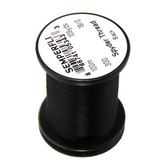 TIEMCO Spyder Thread 18/0 closeup shows translucent micro thread for delicate fly tying.