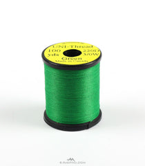 TIEMCO UNI 3/0 waxed thread on a green spool for durable fly tying
