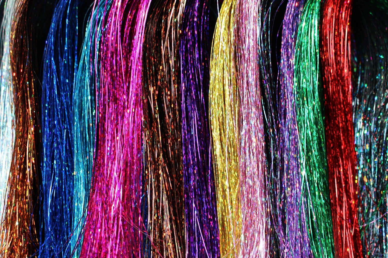 Display of 13 color options for fishing flies