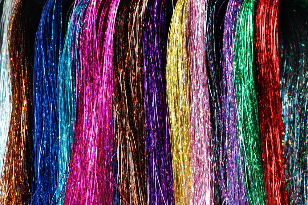 Display of 13 color options for fishing flies