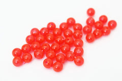 Tigofly UV Red 6mm round plastic fishing beads closeup