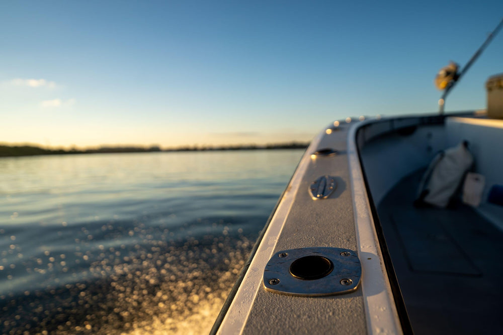 Tigress 4-hole swivel rectangular head rod holder mounted on gunnel for secure rod storage.
