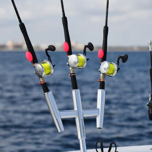 Tigress kite rod holder holding three rods, improving reach and organization during offshore trolling.