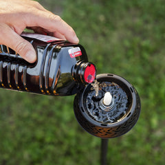 TIKI BiteFighter easy-pour cap enables cleaner fills and less mess.