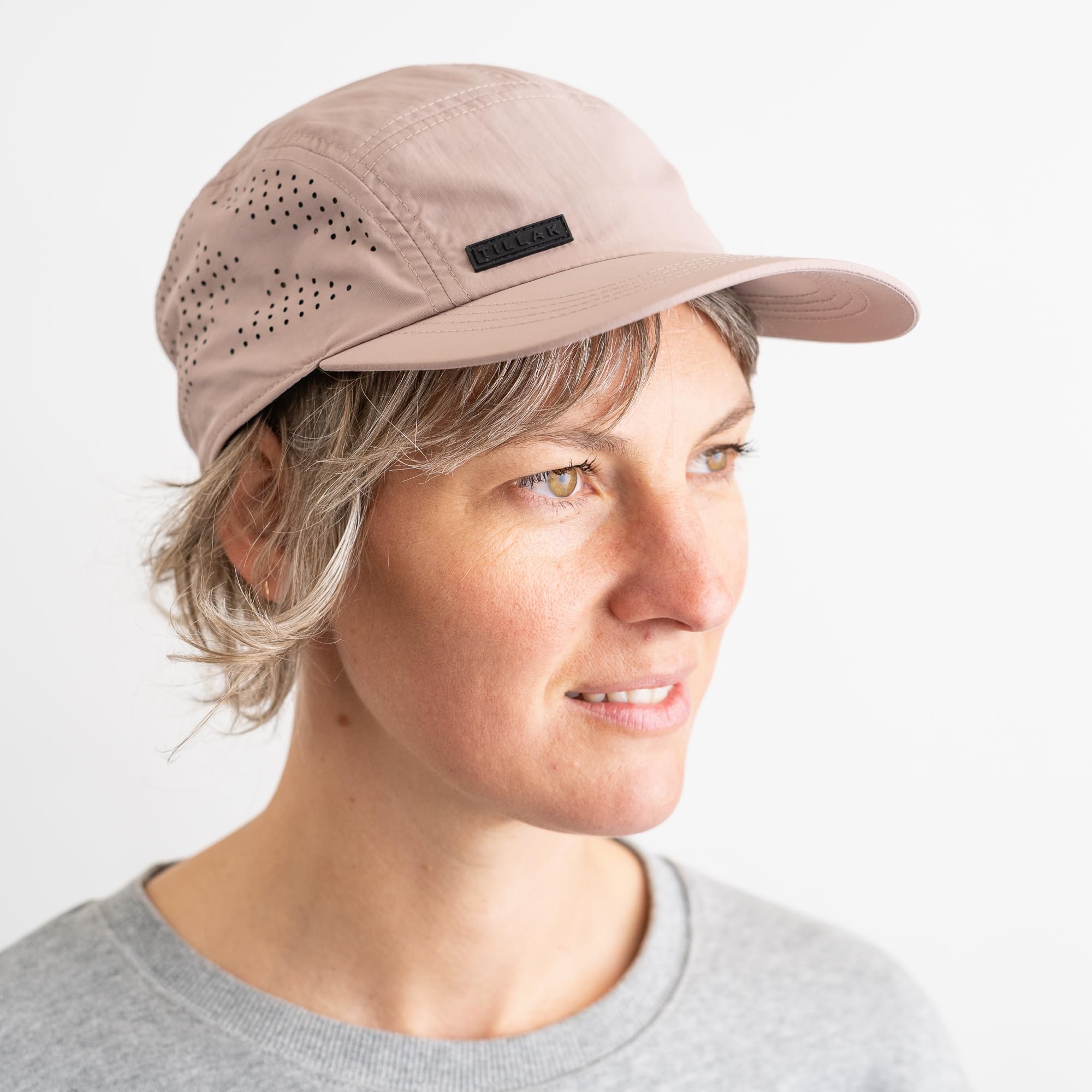 Tillak Vista Hat adjustable snap closure enables versatile sizing during activity