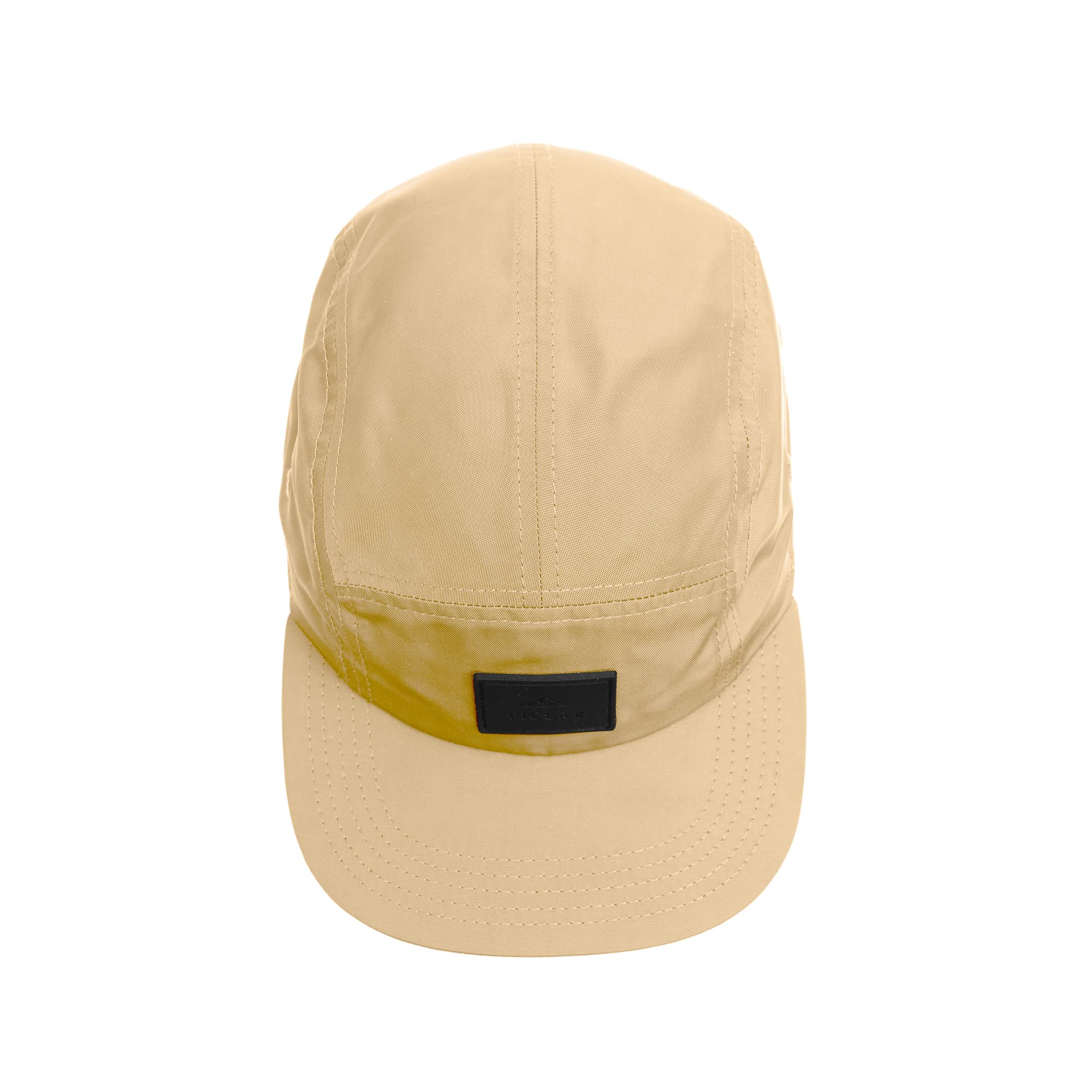 Outdoor setting with Tillak Wallowa Kodra Hat Sandstone
