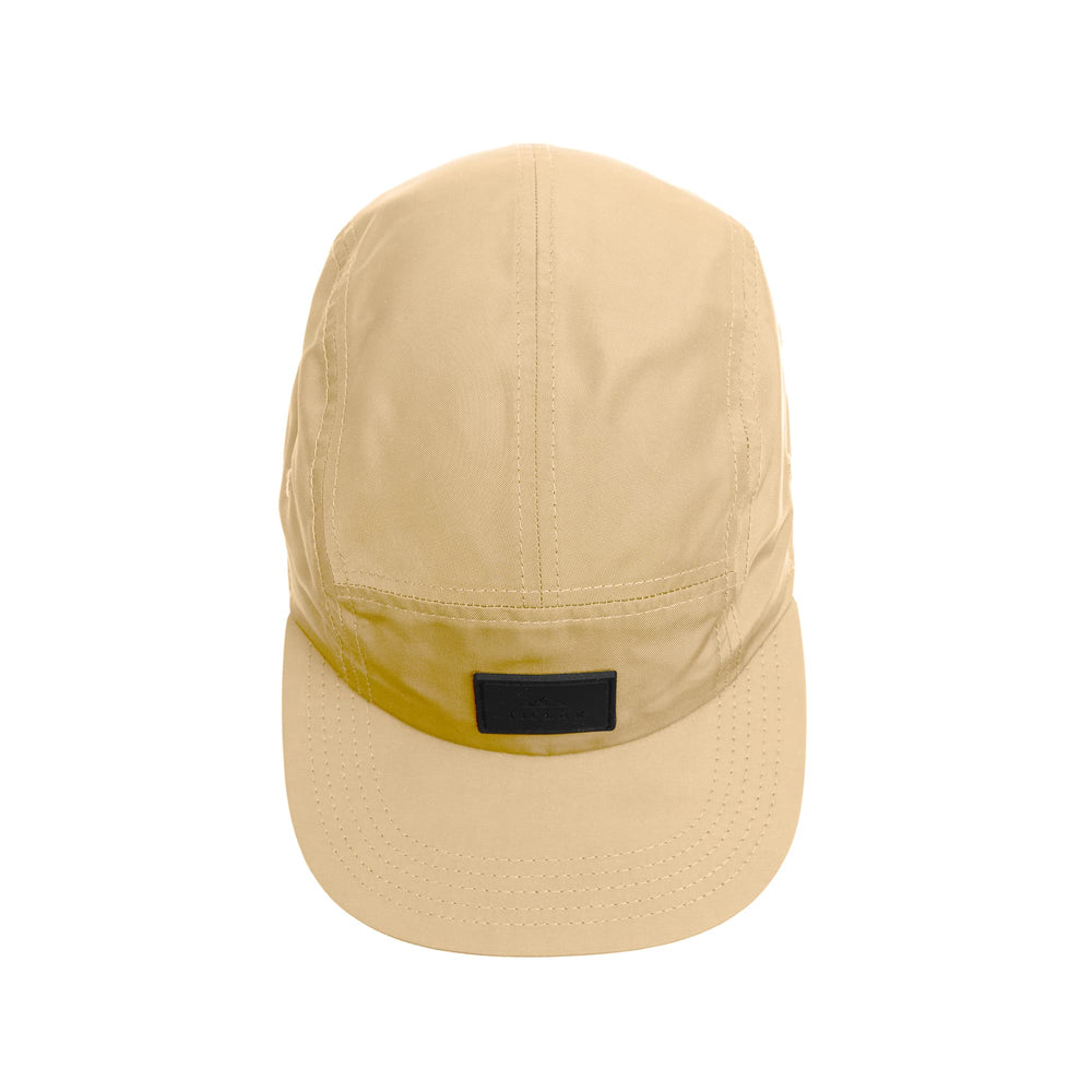 Outdoor setting with Tillak Wallowa Kodra Hat Sandstone