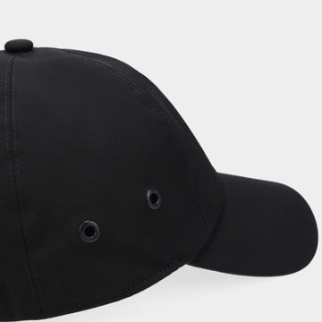 Tilley cap navy with matching accessories for a cohesive travel outfit.