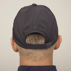 Closeup of Tilley cap navy material showing premium bi-stretch twill.