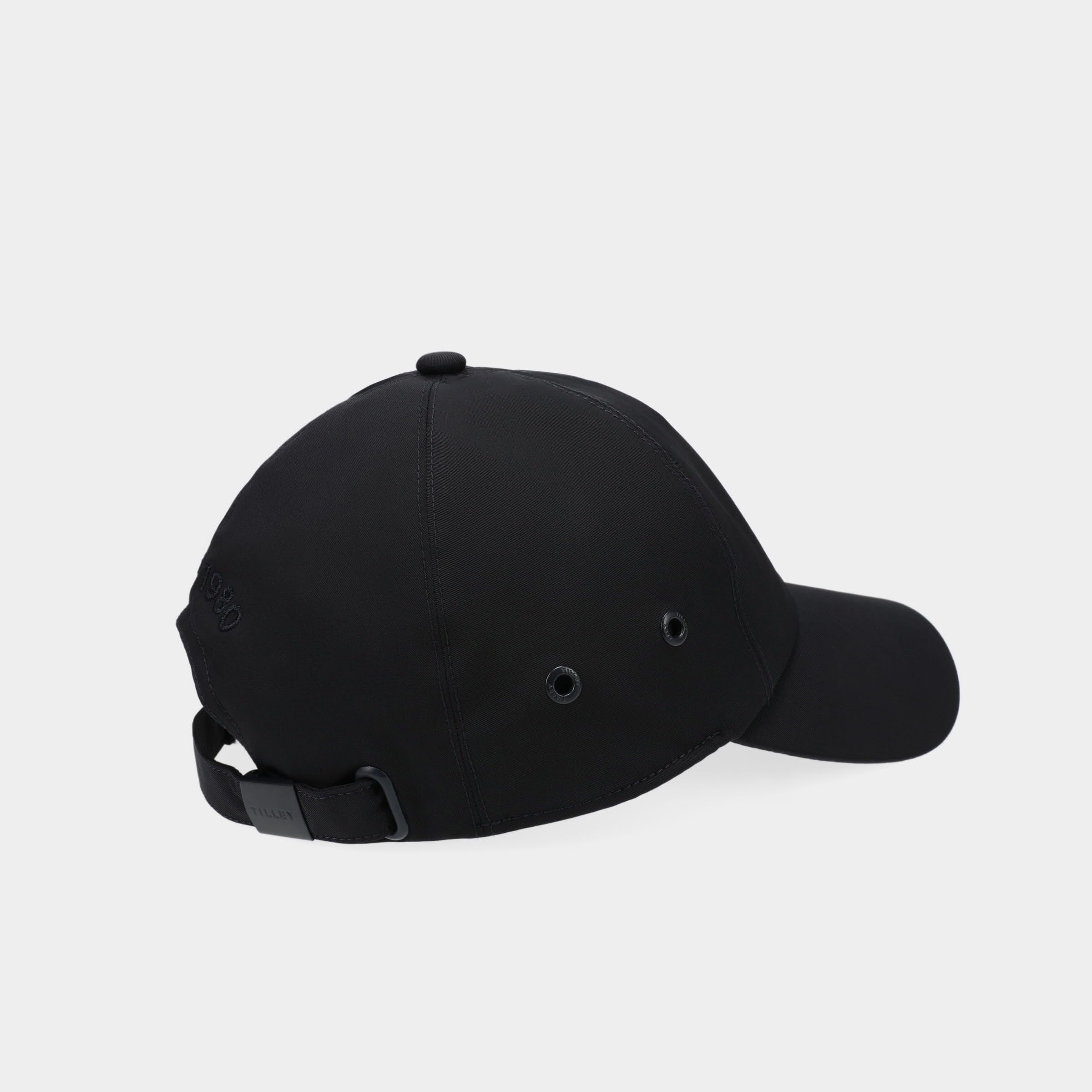 Tilley cap navy debossed logo detail for a sleek, timeless look.