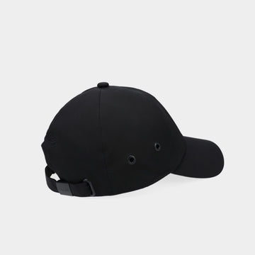 Tilley cap navy debossed logo detail for a sleek, timeless look.