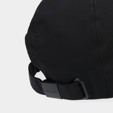 Grommet ventilation detail on Tilley Standard New Tech Travel Cap navy.