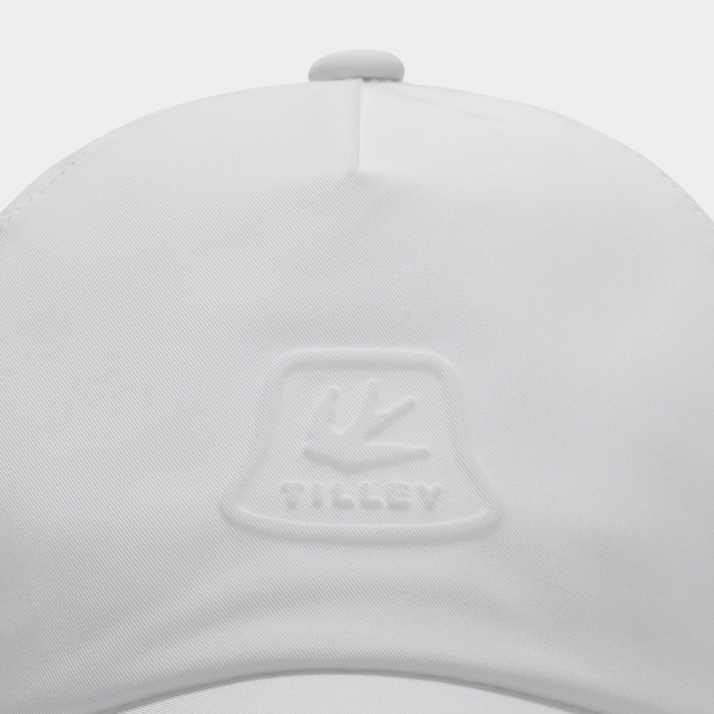Tilley white outdoor lifestyle shot suggesting versatile travel wear