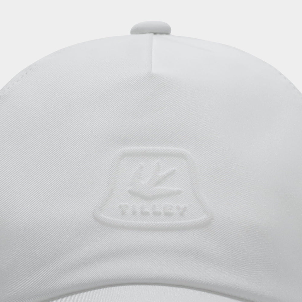 Tilley white outdoor lifestyle shot suggesting versatile travel wear