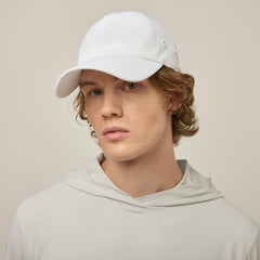 Tilley white travel cap side view highlighting breathable twill and ventilation