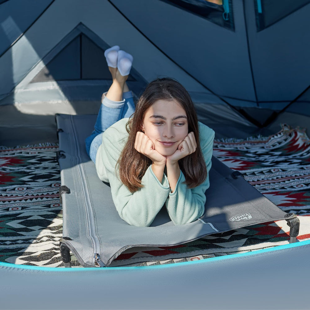 Timber Ridge lightweight camping cot folded for easy transport and storage.