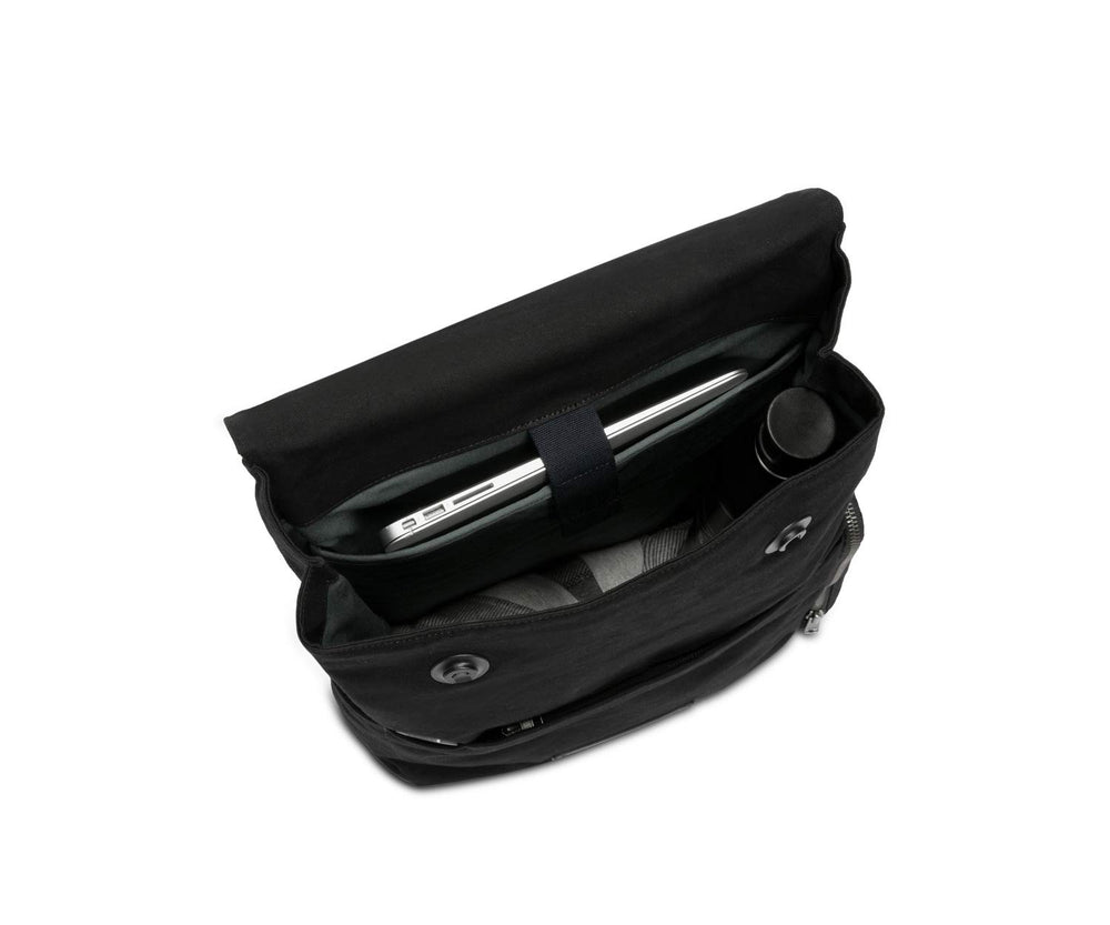 Timbuk2 Foundry interior organizer showing organized pockets for pens, phones, and keys.