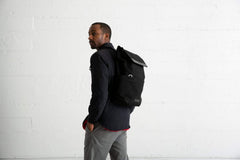 Timbuk2 Foundry water bottle pocket expanded for on the go hydration.