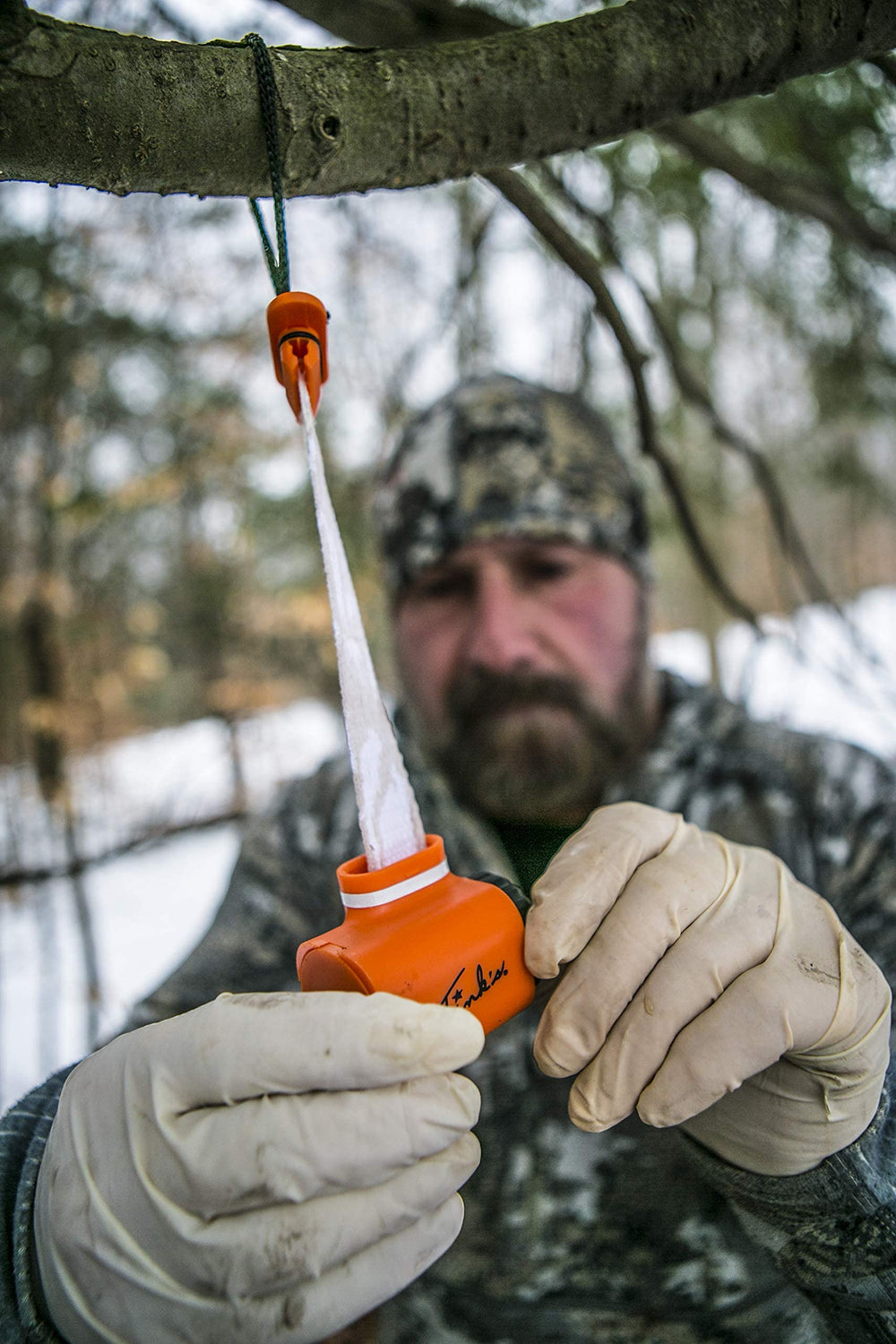 Tink's lure and Scent Reel combo provides field-ready setup for hunts.