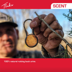 TINK'S Trophy Buck Buck Pucks pre-loaded lure close-up highlights natural urine scent.