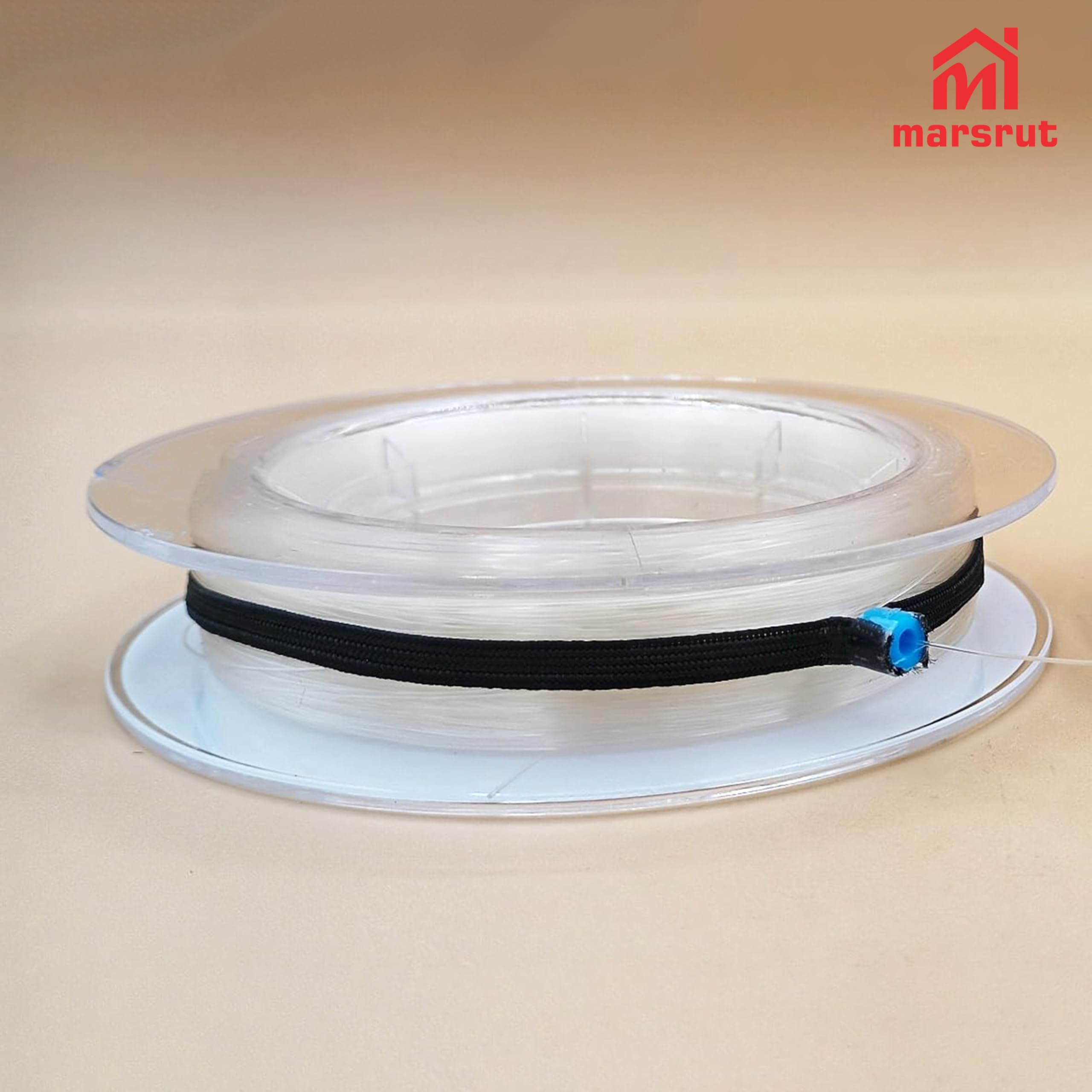 Close-up of elastic band securing a tippet spool