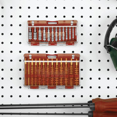 Close-up of caliber-specific slots in the hinged storage box