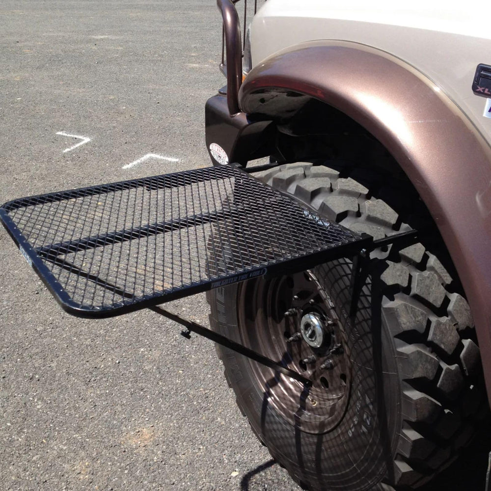 Tire Table folds flat for compact storage after adventures.