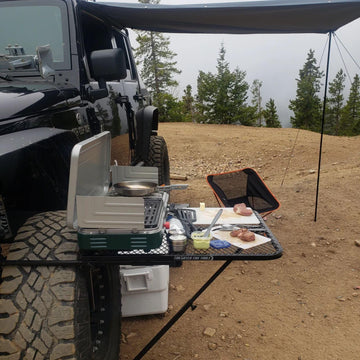 Tire Table Medium Steel camping workspace on uneven ground