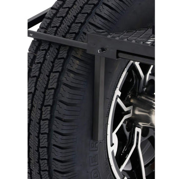Tire Table retractable center leg provides extra support on uneven ground.