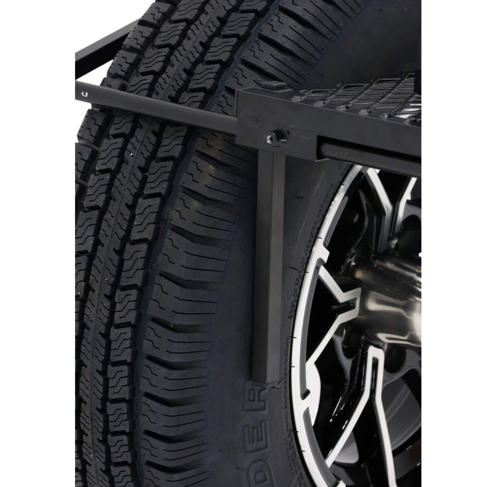 Tire Table retractable center leg provides extra support on uneven ground.