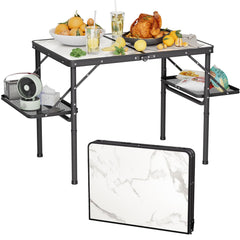 Titanker folding camping table setup provides extra outdoor dining space.