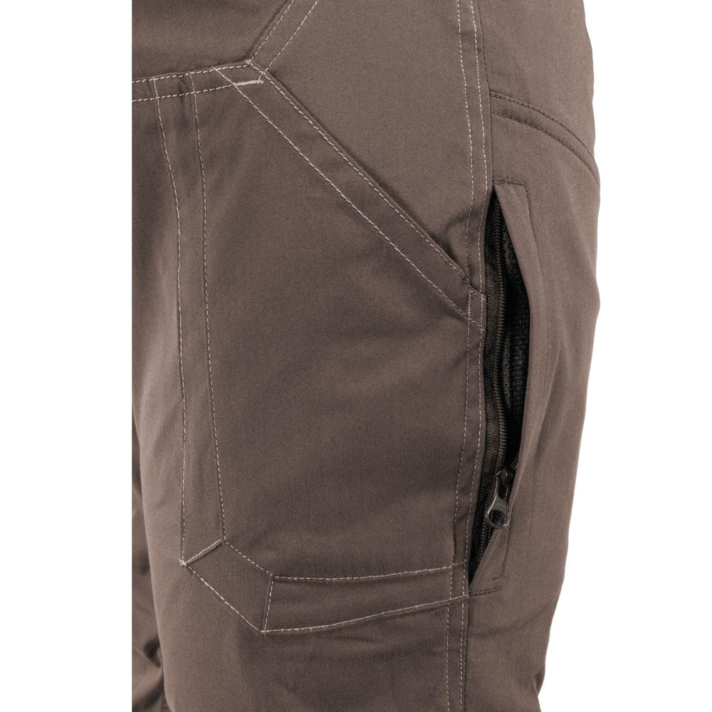TK Flex Rise pants on dock or camp setup showing rugged utility