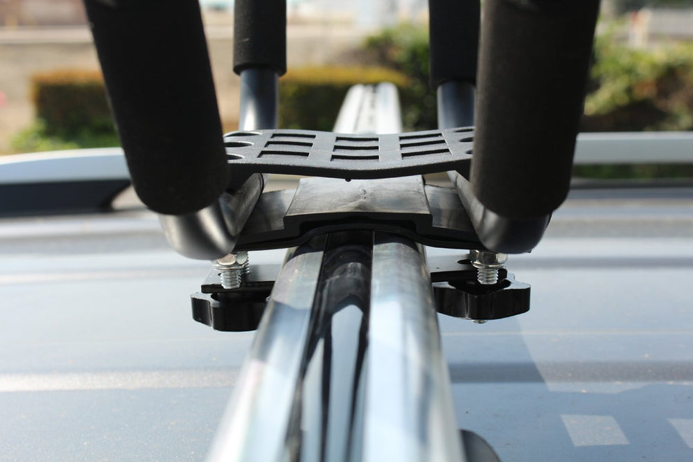 TMS wide-mouth J-bar assists easy loading and unloading of kayak.
