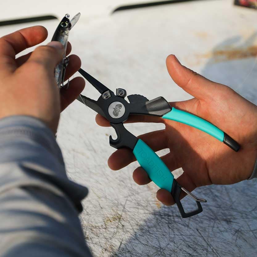 Toadfish 8in Inshore Pliers X-TAC grips provide non-slip control in wet conditions.