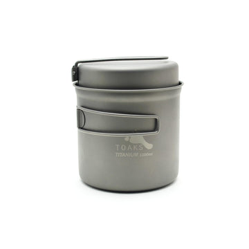 TOAKS Titanium 1100ml pot closeup shows ultralight durability for backpacking meals.