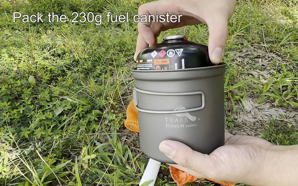 TOAKS Titanium 1100ml pot mesh sack image highlights secure, portable storage.