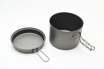 TOAKS Titanium 1600ml Pot with Pan nests with other TOAKS gear.