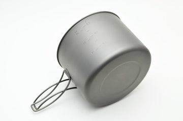 TOAKS Titanium 1600ml Pot with Pan on a stove shows even heating.