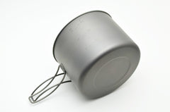 TOAKS Titanium 1600ml Pot with Pan on a stove shows even heating.
