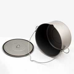 TOAKS Titanium 2000ml pot with mesh storage sack for organized packing.