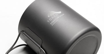 TOAKS titanium cup with mesh sack for organized gear