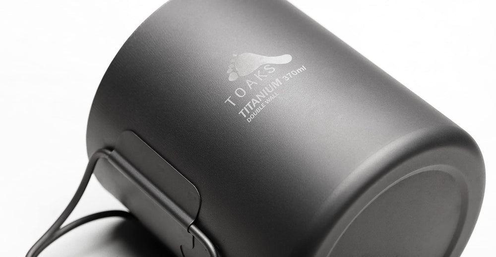 TOAKS titanium cup with mesh sack for organized gear