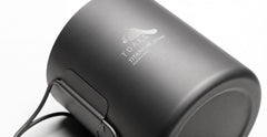TOAKS titanium cup with mesh sack for organized gear